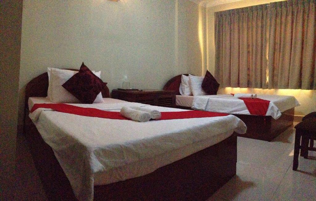 Homeland Guesthouse بنوم بنه الغرفة الصورة